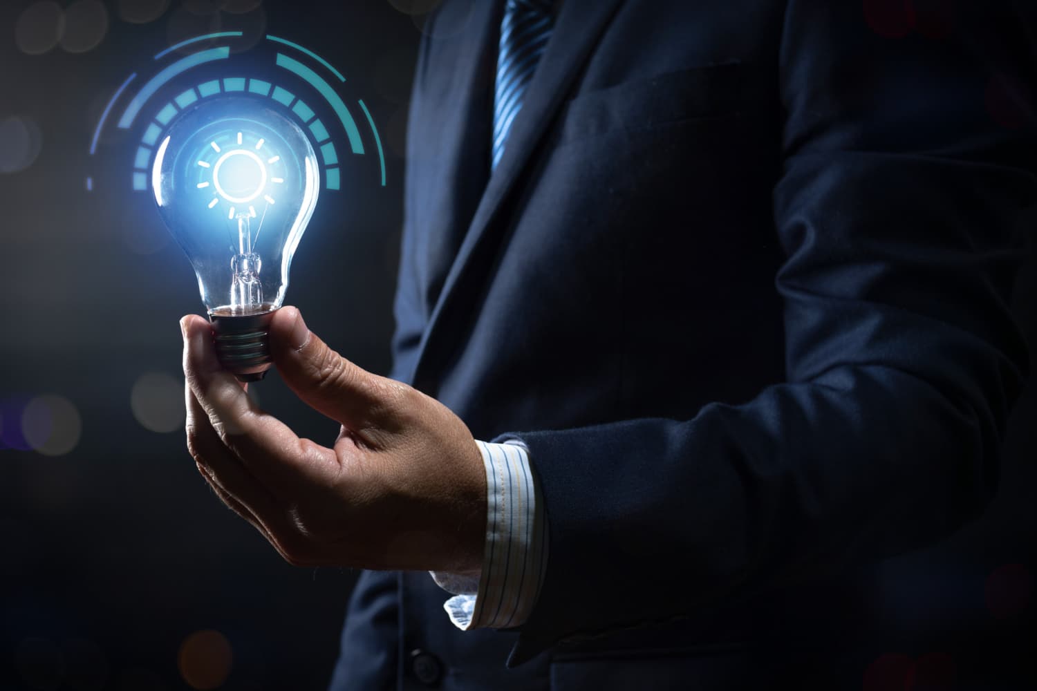 innovation-and-energy-of-creative-thinking-businessman-holding-light-light-bulb-glowing-and-lighting-with-connection